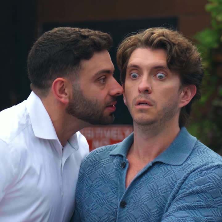 A server gets uncomfortably close to a customer while they order food.